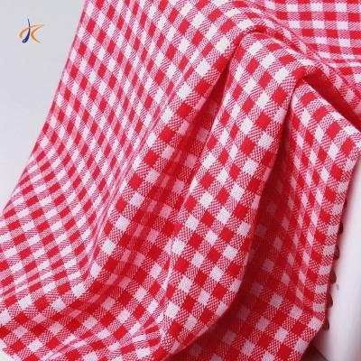 China Hot Sale Anti-static Cotton Woven TC Red Check Plaid Fabric For Shirt Clothing Yarn Dyed Check Fabric for sale