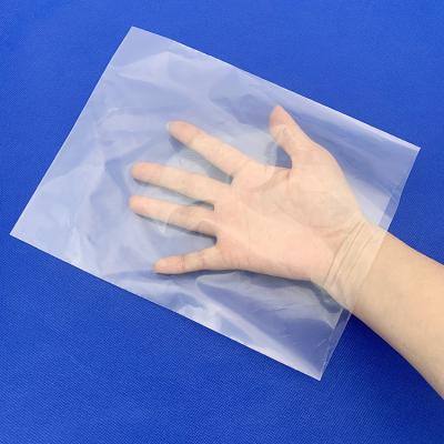 China 25*35cm popular disposable 50 100 micron PE flat bottom clear plastic bag for storing sundries and food. Other sizes can be to customize for sale