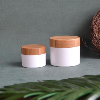 China 15g 30g 50g PLA 100% Cosmetic Biodegradable Cream Jar With Bamboo Lid Cap Cosmetics Packaging for sale