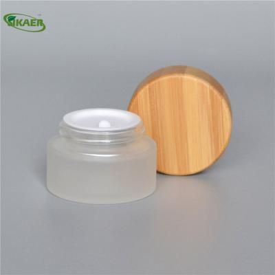 China Environment Glass Cream Bamboo Lids Recyclable Material Frost Jar 15g Organic Travel Pack for sale