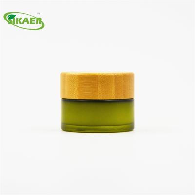 China Customized Personal Care Christmas Made 15g 0.5oz Eye Gel Organic Green Gel Glass Cream Jar With Bamboo Lid for sale