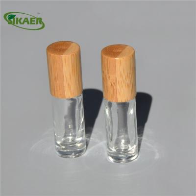 China Personal Care Wholesale Perfume Essential Oil 3ml 10ml 15ml Bamboo Glass Roll On Bottle With Bamboo Lid for sale