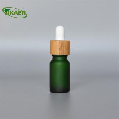 China Recycable Amber Green 5-100ml Glass Oil Bottles With Rubber Top Screw Cap Dropper Essence Moisturizer Bottles for sale