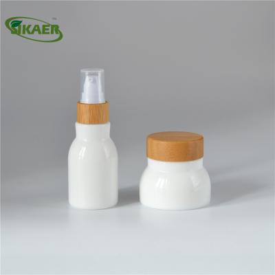 China Recycle Factory 2019 New Design Wooden Pump With Organic Cosmetic Porcelain Bottles Packaging for sale