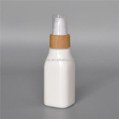 China White Personal Care Ceramic Porcelain Cosmetics Bottle Ceramic Toner Jar With Eco-Friendly Bamboo Pump Bottle for sale