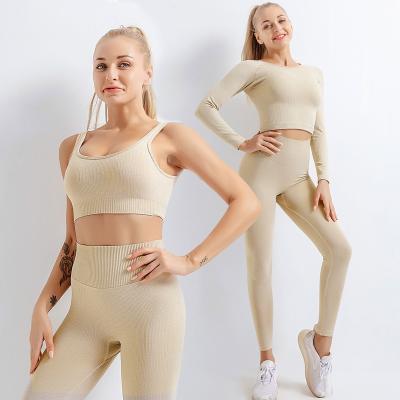 China 2022 Breathable Hot Selling Knitted Three-Piece Sports Seamless Bra Top Yoga Pants Hip-lifting Yoga Pants Set For Women for sale