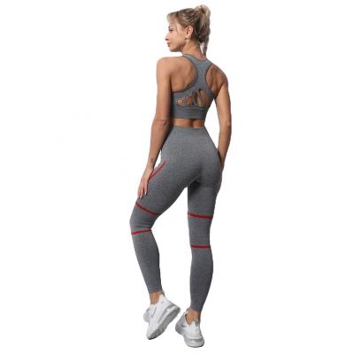 China Latest Women's Fitness Clothing Women's Sportswear Yoga Bra Breathable Gym Gaiters And Leggings Activewear Seamless Set for sale