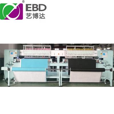 China Garment Shops YBD64”X 2 Two Control Systems And Two Worktables Rotary Hook Quilting Machine for sale