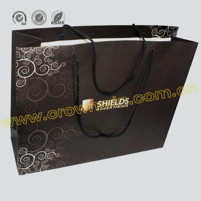 China Recycled Materials Best Selling High Quality Geometric Design Paper Gift Bags With Flat Paper Handles Custom Handmade Customized for sale