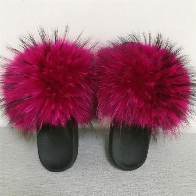 China Fashion trend fluffy leather slipperswholesale raccoon fur slippers real lace fur warm slippers for sale