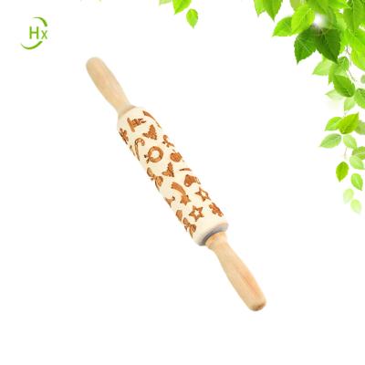 China Rolling Pin Natural Custom Kitchen Baking Sustainable Cookies Christmas Carved Wooden Embossed Pin for sale