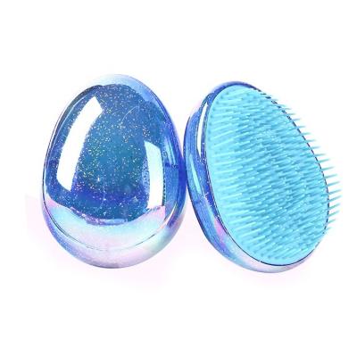 China Hair salon beauty care new design egg shaped plastic detangling hair brush for sale