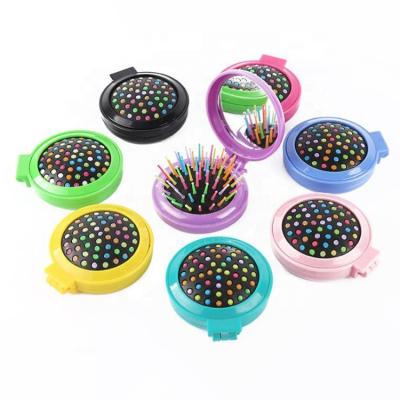 China Best Price Portable Round ABS Plastic Hair Pocket Mirror Foldable Comb for sale