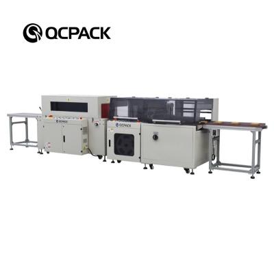 China Automatic Food Wrapping Tray Shrink Packer Machine for sale