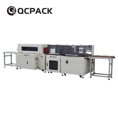 China Full Automatic GARMENT Side Sealer Shrink Wrapping Machine For Wrapping A4 Paper for sale