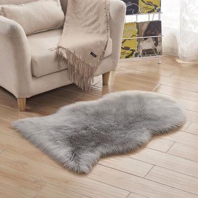 China Stain Resistant Soft Faux Fur Area Rug Carpets Living Room Plush Artificial Fur Rug Sheepskin Shaggy Fur Long Carpet Mat For Bedroom for sale