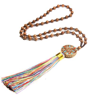 China Wooden Wood Beads Handmade Braid Necklace With Tassel Pendant for sale