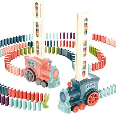 China The light educational toys train set stacking automatic placement building block electric domino train toys for sale