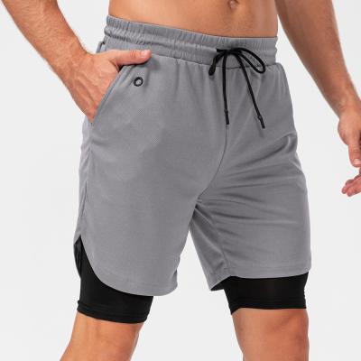 China 2022 Inner Pockets Two Piece Quick Dry Zipper Earphone Hole Pants Mens Double Layer Breathable Fitness Cargo Running Shorts for sale