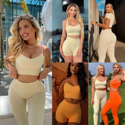 China 2022 Custom Logo Breathable Clothing Outdoor Fitness Workout Gym Wear Set Ribbed Women Fitness 5 Piece Seamless Yoga Set for sale