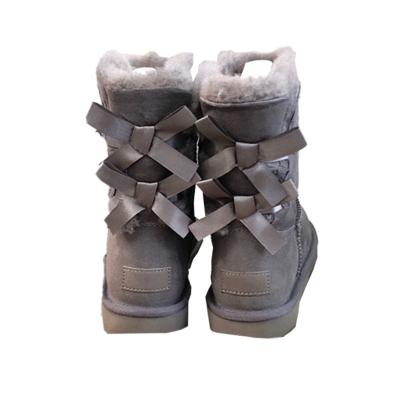 China Cushioning Factory Direct Wholesale Winter Warm Sheepskin Fur Boots Waterproof Furry Uggh Snow Boots For Women for sale