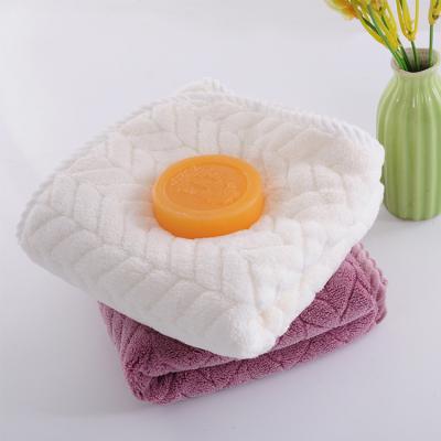 China Child-Proof Wholesale stock microfiber coral fleece color face towel hand towel for sale