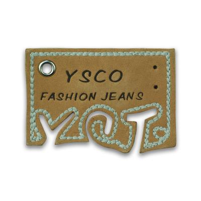 China Custom Made High Quality Leather Patch Washable Logo Sewed Letter Embroidered Patch For Jeans for sale