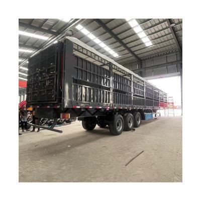 China Carga útil máxima 30000 kg 40Ft 3 eixo fecho de armazém semi-reboque para transporte de gado à venda