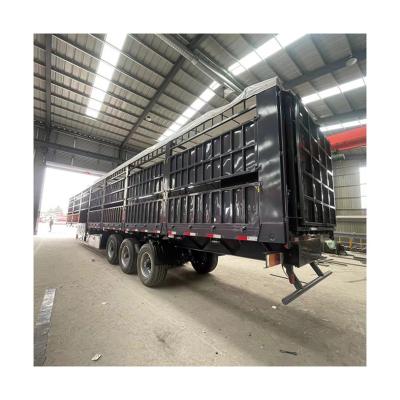 China Truck Trailer voor vrachtvervoer Huaxiang 3 assen 40 ton hek zijwand half-trailer Te koop