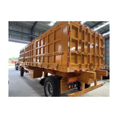 China 35 ton capaciteit Semi-trailer Steel Flatbed Full Trailer met klanten optioneel Te koop