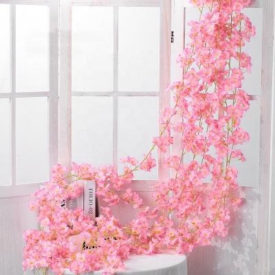 China Silk+Plastic Simulation Cherry Blossoms Hot Selling Plastic Vine For Air Conditioning Pipe Vine Flower Strip Tree Vine Wrapping Decor for sale