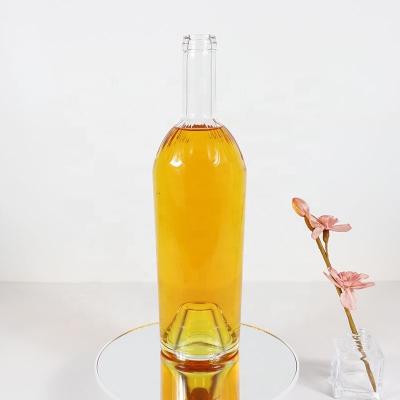 China Round Shape Glass Liquor Bottle 850ml Whiskey Gin Tequila Rum Bottle Beverage Bottle With Cork Stopper for sale