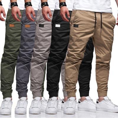 China 2021 QUICK DRY Spring and Autumn Men New Arrival Plus Size Solid Color Drawstring Cargo Casual Jogger Pants Overalls for Men for sale