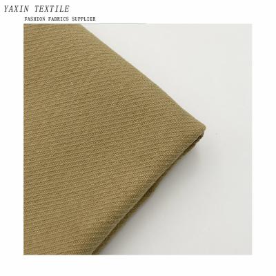 China Abrasion-resistant in stock woven cotton cavalry twill stone wash for coat braces fabric for sale