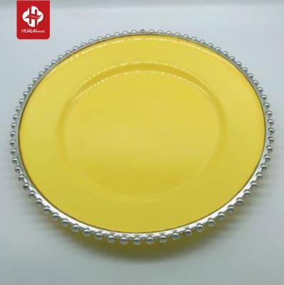 China Sustainable Luxury A Grade Custom Silver Beaded Rim Yellow Plastic Charger Dish For Wedding Dinner for sale