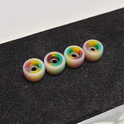 China Youth Mix Color Durometer Handmade Double Fingerboard Wheels for sale