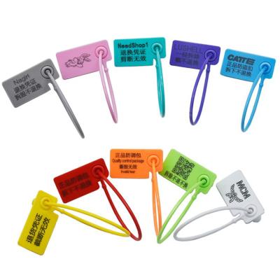 China Disposable Plastic Seals Hang Tags White Zip Ties Custom Garment Safety Label Tag for Clothes Shoes Bag Standard Size for sale