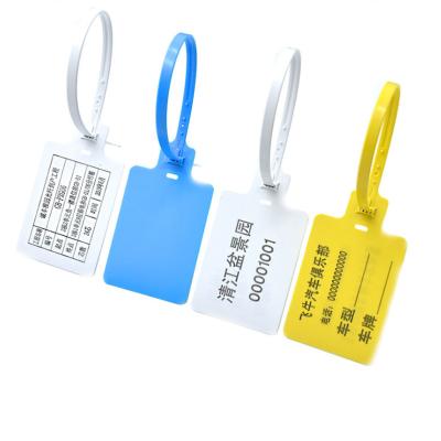 China Disposable White Yellow Plastic Garment Security Seal Tag For Clothes Shoes Bags Standard Size for sale