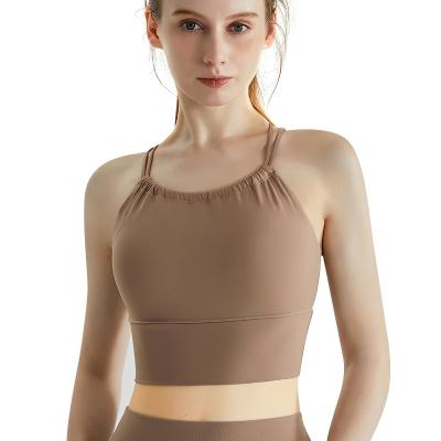 China Beautiful Breathable One-Piece Unique Sexy Cross Temperament Sports Bra Yoga Crop Back Tank Top Harness Popular for sale