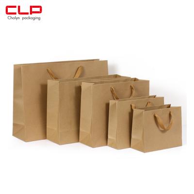 China Custom Size High Quality Wholesale Recyclable Logo Paper Packaging Recyclable Kraft Paper Shopping Handbag for sale