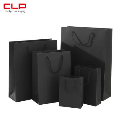 China Custom Recyclable Logo Kraft Paper Packaging Bag Shopping Bag Recyclable Paper Handbag for sale