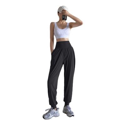 China OEM 2023 Breathable Extrude Solid Color High Quality Pants Long Drawstring Fashion Yoga Pants Comfortable Women Pants Plus Size Pants for sale