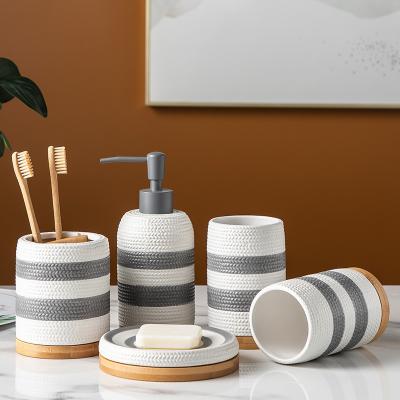 China Sustainable Bathroom Set Accessories Design Ceramic Bottle New Style Bars Bathroom Products for sale