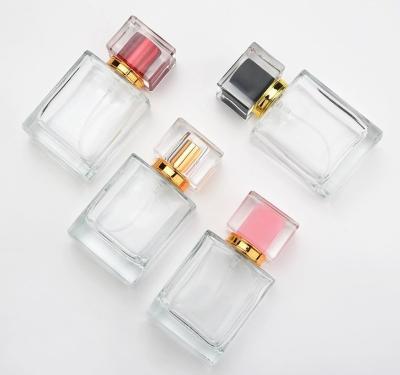 China 100MLempty Personal Care Glass Bottle Refillable Wholesale Square Pump Spray Perfume Glass Clear Bottle for sale