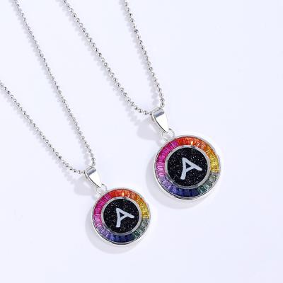 China Environmentally Friendly Custom Round Medal Rainbow Color Gradient Diamond Letter Pendant Necklace In S925 Silver for sale