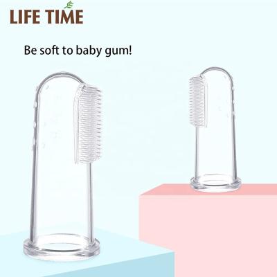 China Baby Care Safety Food Grade 100% Soft Silicone Baby Finger Toothbrush for sale