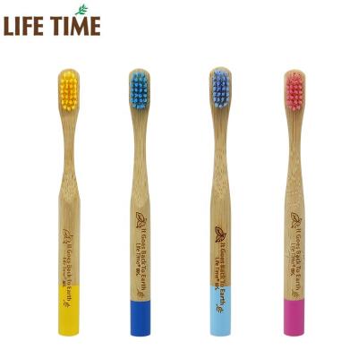 China Other sample kids free wooden toothbrush bambu soft teeth brush cylindrical handle kids bamboo toothbrush for sale