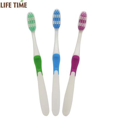 China Cheap Adult Toothbrush Factory Direct Wholesale Private Label Free Sample Anti-Slip Toothbrush With Tongue Cleaner for sale