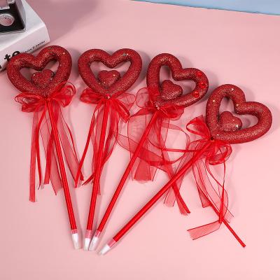 China 100% Valentine's Day Personality Heart Tip Pen Advertising Gift Red Ribbon Love Eco-friendly Ball Pens for sale