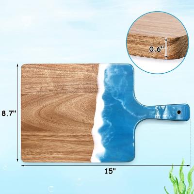 China Customized Viable Wooden Serving Cutting Board Dark Brown Ocean Acacia Cheese Boards Size Blue Epoxy Resin Art for sale